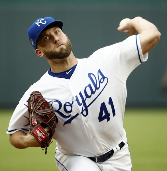 Kansas City Royals starting pitcher Danny Duffy throws during the first inning of the team's baseball game against the Minnesota Twins on Tuesday, May
