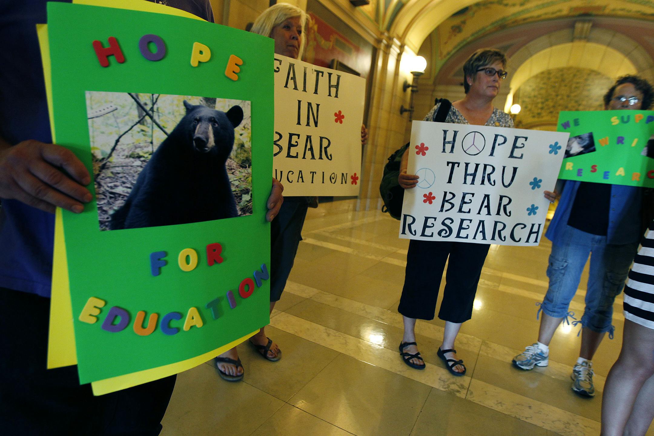 Supporters of bear researcher Lynn Rogers stood in the hall to support Rogers after his meeting with Gov. Mark Dayton.