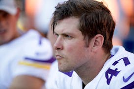 Minnesota Vikings long snapper Kevin McDermott watches during warm ups before an NFL football game against the Denver Broncos Saturday, Aug. 11, 2018,