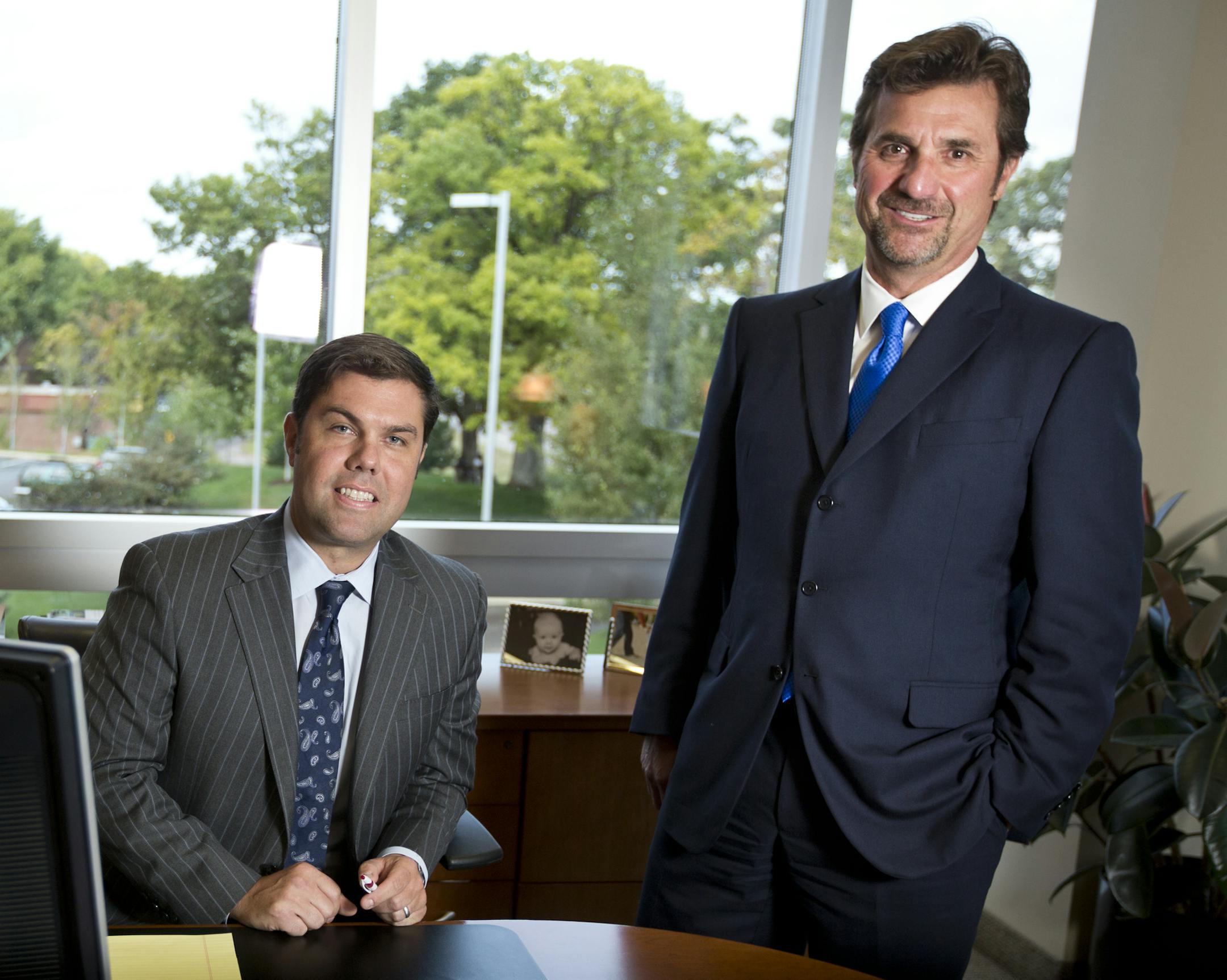 John Feste and Ben Marks of Marks Group Wealth Management posed for a picture in an office at the building on Thursday, September 19, 2013, in Minnetonka, Minn. ] (RENEE JONES SCHNEIDER ‚Ä¢ reneejones@startribune.com)