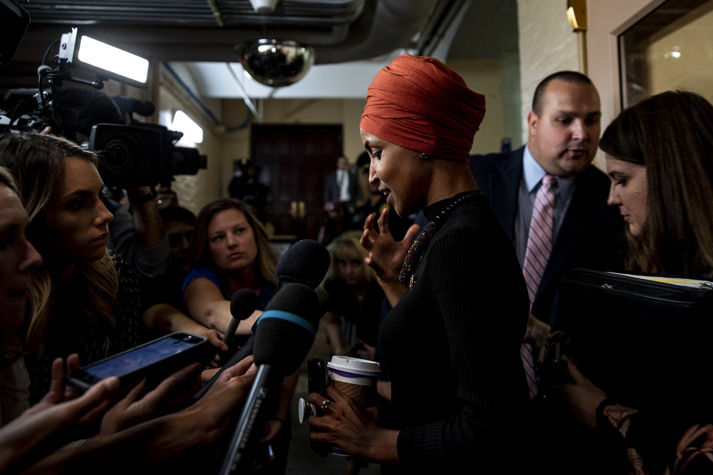 Rep. Ilhan Omar (D-Minn.) speaks to reporters on Capitol Hill in Washington, Sept. 24, 2019. House Speaker Nancy Pelosi (D-Calif.) announced that the House would begin a formal impeachment inquiry of President Donald Trump, taking decisive action in response to startling allegations that the president sought to enlist a foreign power for his own political gain. (Anna Moneymaker/The New York Times)