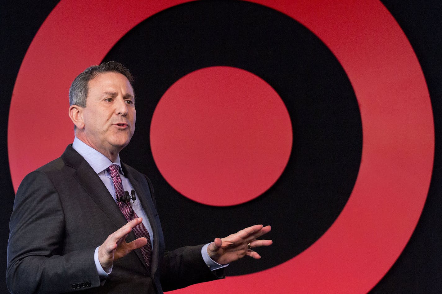 FILE - In this Wednesday, March 2, 2016, file photo, Target Chairman and CEO Brian Cornell speaks to a group of investors, in New York. Target, stung by the mass migration online, said Tuesday, Feb. 28, 2017, its profit plummeted 43 percent during the most recent quarter as sales at its stores weakened. The coming year doesn&#x2019;t look much better: Its outlook for the first quarter and all of 2017 were far below what industry analysts had been expecting. (AP Photo/Mark Lennihan, File)