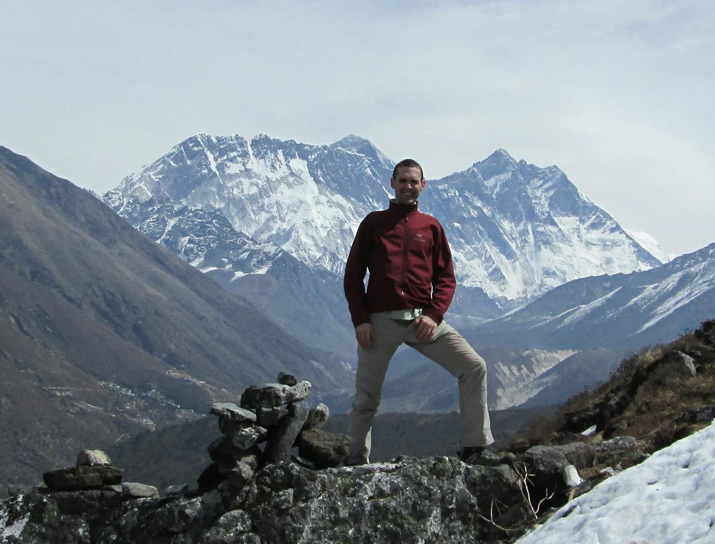 Andrew Towne poses for a photo on April 7, 2015, from a ridge above the Tengboche Monastery, during a trek to Mount Everest basecamp. Everest is poking out from behind Nuptse in the background. Photo provided by Andrew Towne Towne, of Minneapolis, will attempt to summit Mount Everest in April 2017. This is his second attempt. Last time, in 2015, his attempt was thwarted when Nepal was hit by an earthquake and avalanche.