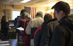 A long line formed at the tiny one room of Douglas Town Hall on Election Day on Tuesday, November 6, 2018, in the area of Douglas Township, Minn. The 