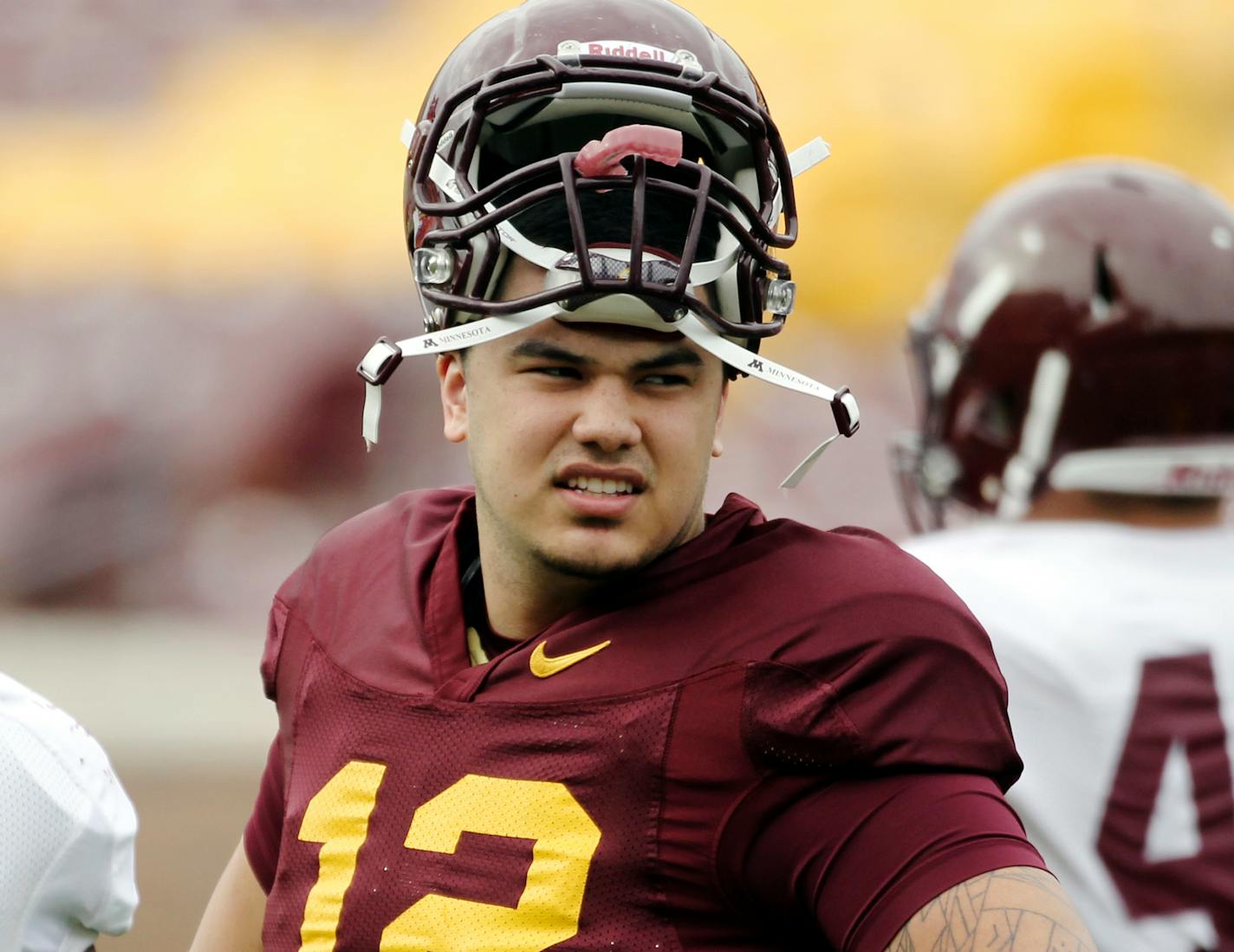 University of Minnesota tight end Moses Alipate (12) during practice at TCF Stadium in Minneapolis, MN, Tuesday, April 17, 2012.] (DAVID JOLES/STARTRIBUNE) djoles@startribune.com - The University of Minnesota's Moses Alipate (12) is making the transition from quarterback to tight end. He was photographed during practice Tuesday, April 17, 2012, at TCF Stadium in Minneapolis.**Moses Alipate,cq