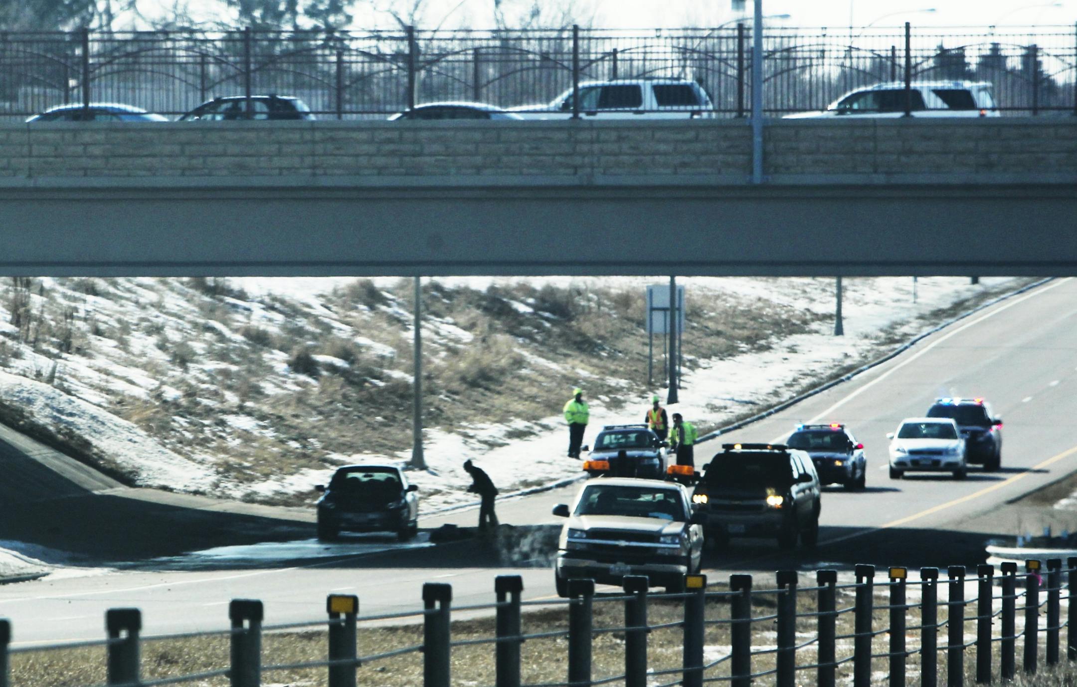 The scene of a fatal accident Wednesday morning involving a motorist who out of a car on northbound Hwy. 169, beneath Pioneer Trail in Bloomington.