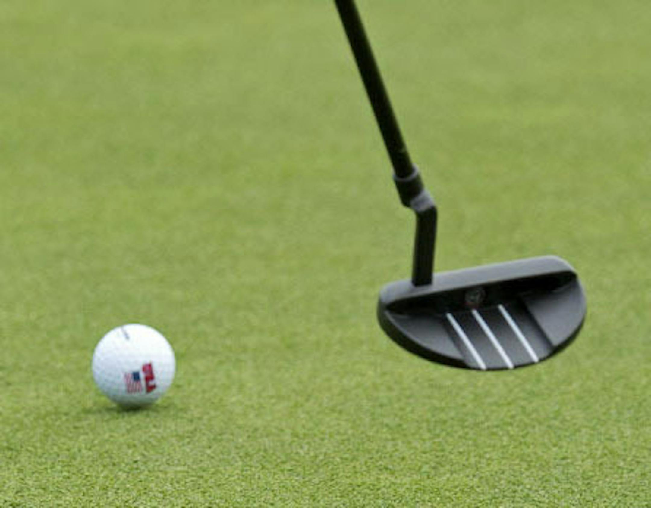 Paula Creamer of United States putts the ball ball in the singles on Day3 at the Solheim Cup golf tournament in St. Leon-Rot, southern Germany, Sunday, Sept. 20, 2015. USA won the competition. (AP Photo/Jens Meyer) ORG XMIT: MIN2015110218005311