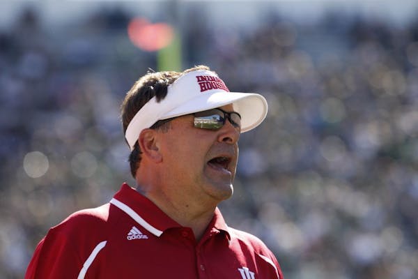 Indiana coach Kevin Wilson yells from the sidelines during the fourth quarter of an NCAA college football game against Michigan State, Saturday, Oct. 