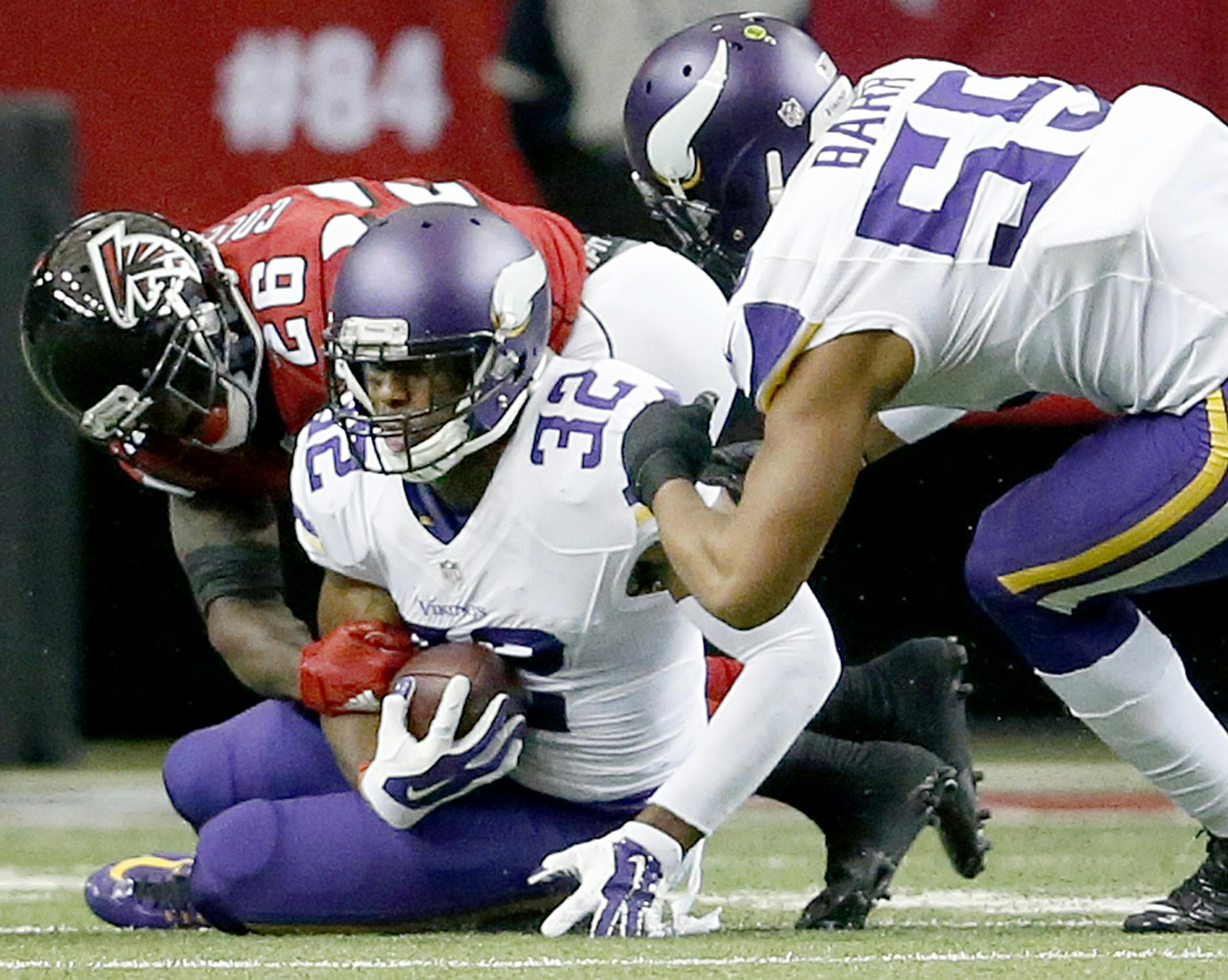 Antone Exum Jr. (32) recovered a fumble by Tevin Coleman (26) that was forced by Anthony Barr (55) in the first quarter. ] CARLOS GONZALEZ ï cgonzalez@startribune.com - November 29, 2015, Atlanta, GA, Georgia Dome, NFL, Minnesota Vikings vs. Atlanta Falcons