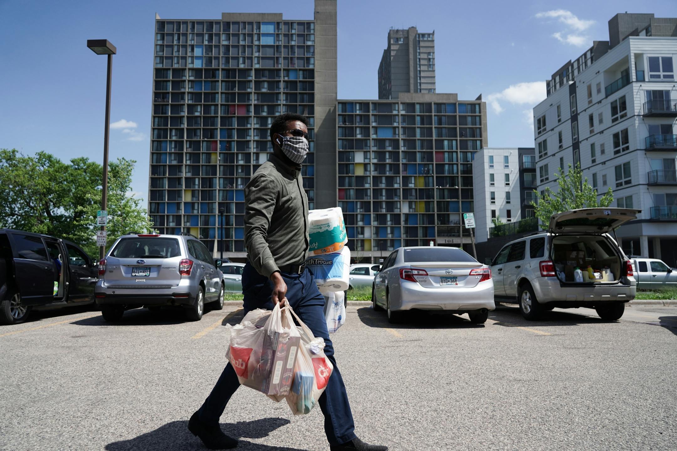 Yousif Hussein said he'd been helping unload donations at the Brian Coyle center in Cedar-Riverside all day. He lives near the Fifth Precinct and has been volunteering his time at donation drives across the city.