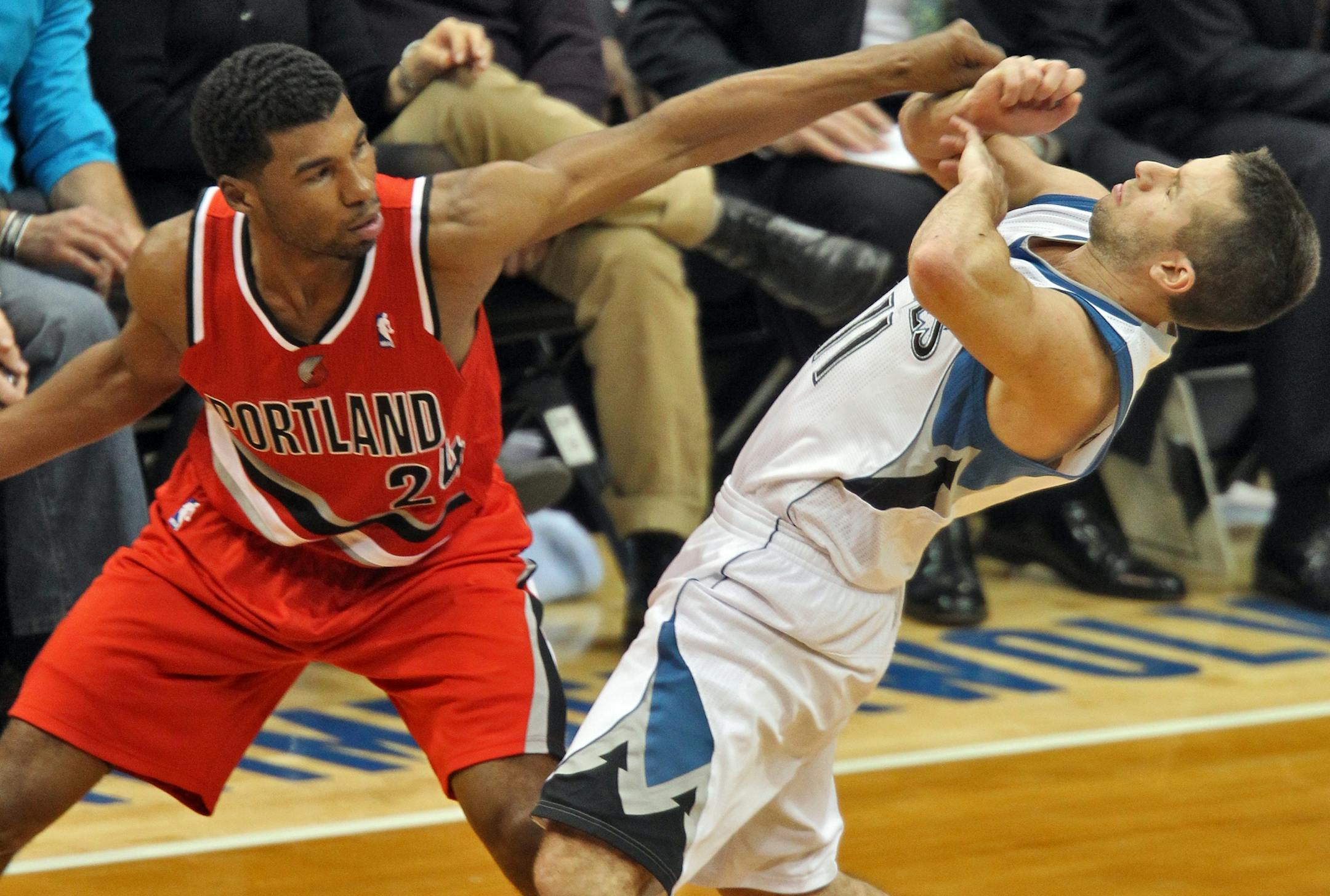 Wolves' J.J. Barea (right)