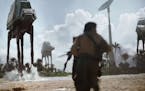 Imperial AT-ATs attack in "Rogue One: A Star Wars Story."