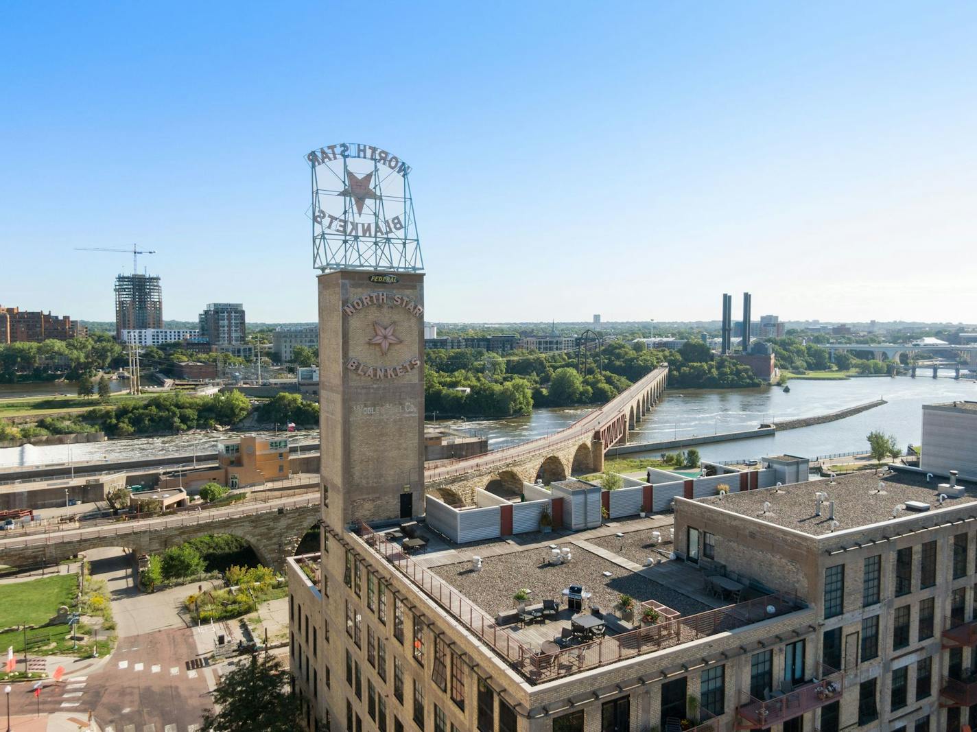 Homegazing - $3.195M condo in North Star Lofts, a converted 1920s woolen blanket mill, with spectacular views of mighty Mississippi. Credit Spacecrafting