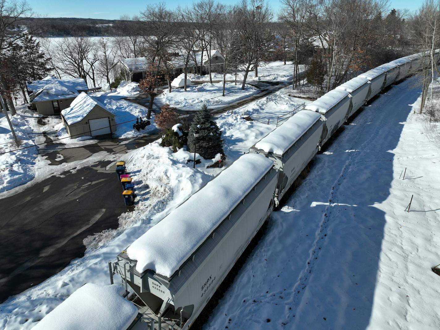 Lakeville residents have complained for a decade about a local company's storage of up to 60 railroad cars on the tracks near residential areas, like here along Jersey Ave, saying that the cars' presence lowers property values and are dangerous because kids play on them.Tuesday, Feb. 7, 2023 Lakeville, Minn. Now the combination of federal aid and funding from a proposed state bill could solve the problem through the construction of a railroad car storage facility, though more funds may still be needed to cover the total cost. ] Brian Peterson • brian.peterson@startribune.com