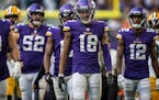 Minnesota Vikings wide receiver Justin Jefferson (18) and teammates walk to the line of scrimmage in the first half , in Minneapolis, Minn., on Sunday