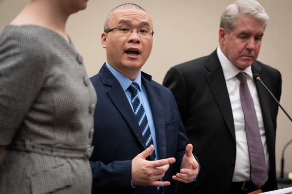 Tou Thao, center, speaks during his sentencing hearing in Hennepin County District Court on Monday, Aug. 7, 2023, in Minneapolis. Thao, the ex-Minneap