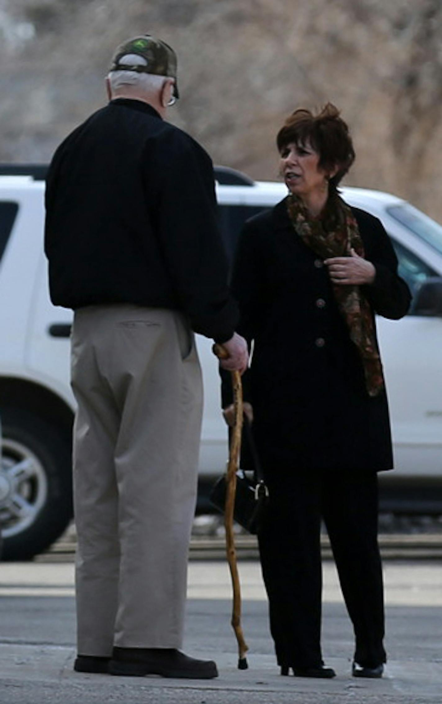 Cheri Ekbom, Lila Warwick's daughter, talked with neighbor Irwin Tallakson after Brok Junkermeier was sentenced to life in prison without parole for the murder Ekbom's mother in Willmar, Minn. ] MCKENNA EWEN mckenna.ewen@startribune.com - April 9, 2014, Minneapolis Star Tribune