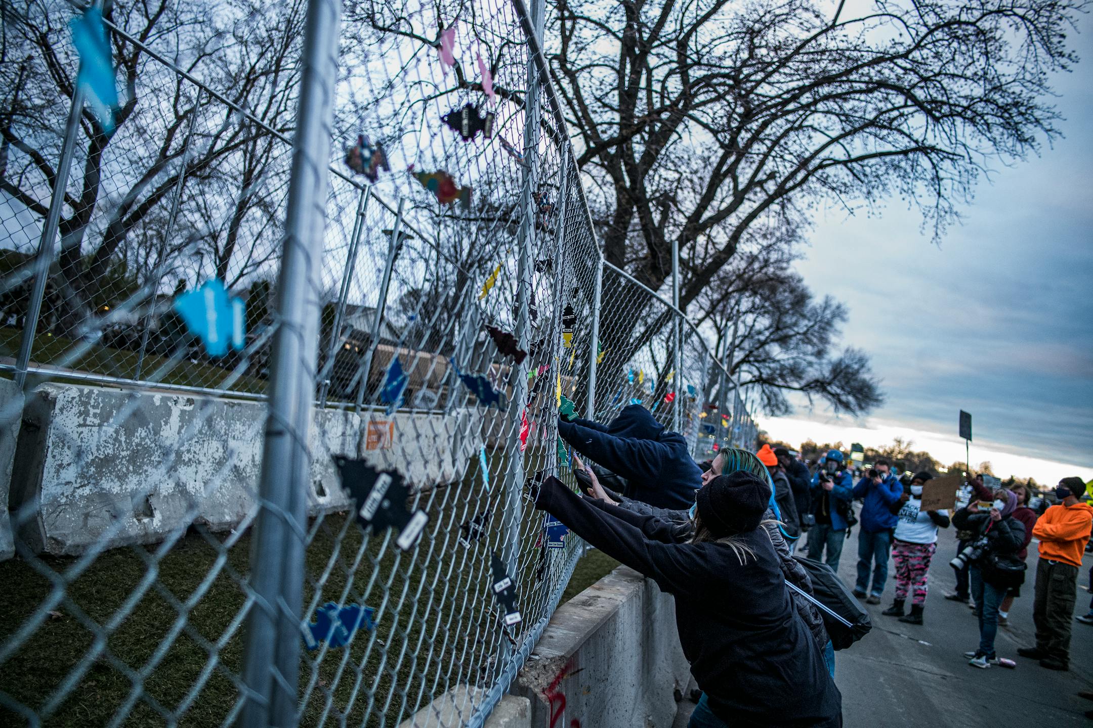 People protest near the Brooklyn Center Police Department in response to the fatal police shooting of Daunte Wright, Thursday, April 15, 2021 in Brooklyn Center, Minn.