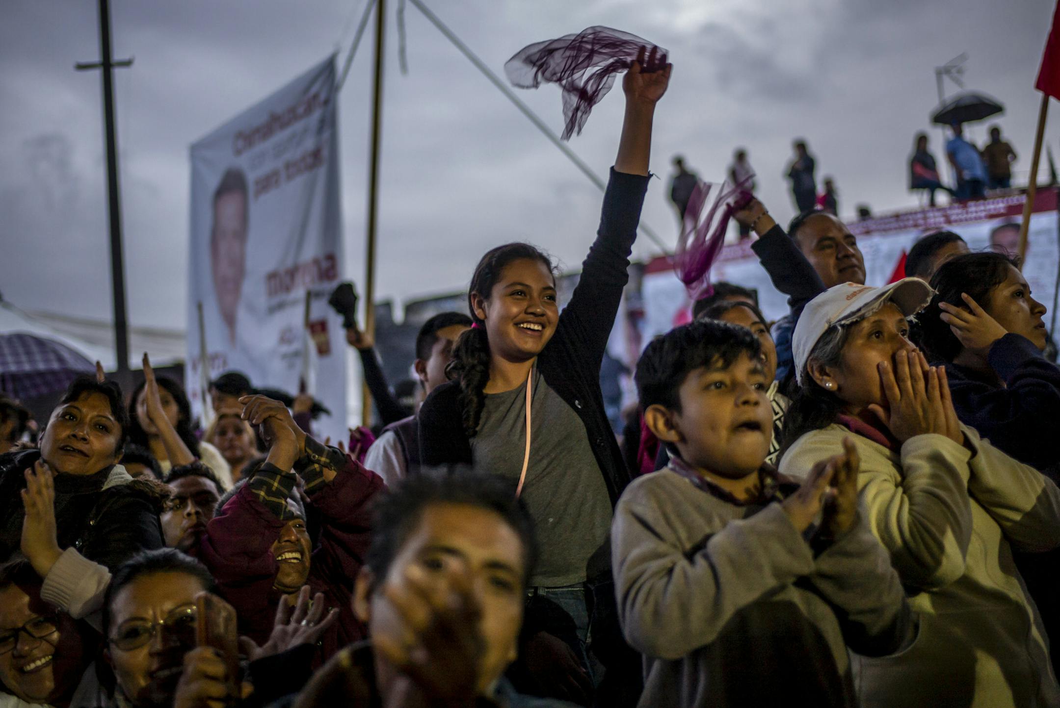 A young supporter of presidential candidate AndrÈs Manuel LÛpez Obrador during a campaign rally in Chimalhuac·n, on the outskirts of Mexico City, June 14, 2018. As Mexico gears up for a watershed election on July 1, with more than 3,000 positions at stake, one sector of the Mexican population could well determine the outcome: Mexicoís millennials and the subsequent Generation Z. (Alejandro Cegarra/The New York Times)