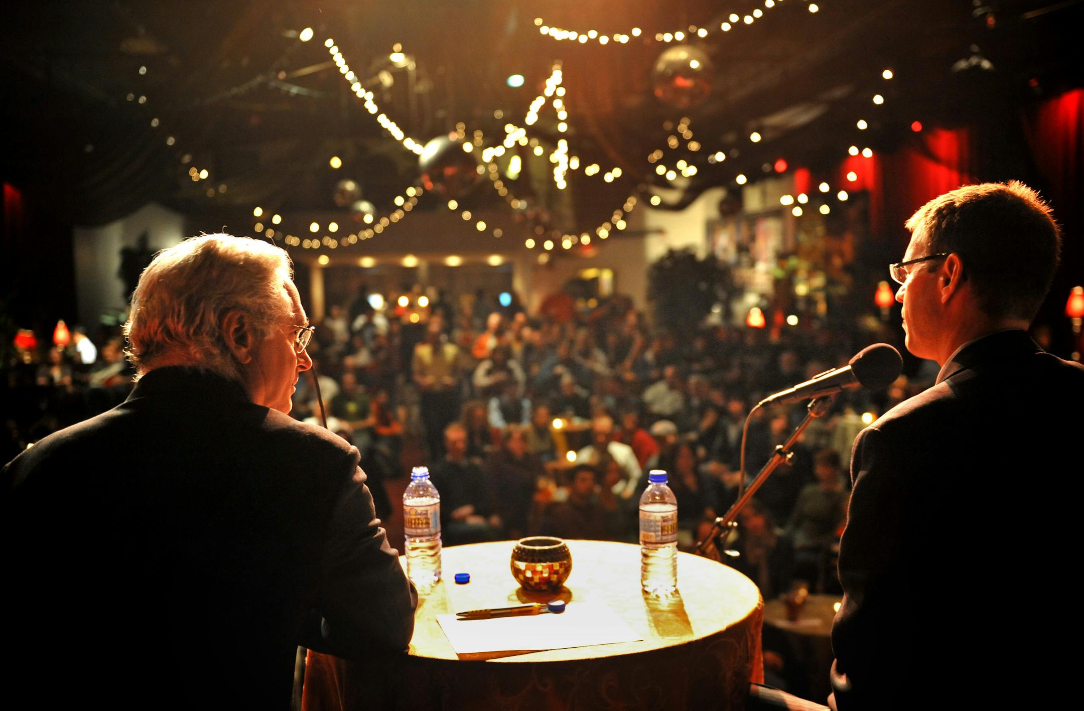 Minnesota Public Radio's Chris Farrell, left, and Edina Certified Financial Planner Jonathan Guyton answered questions at the Varsity Theater during A Policy and A Pint sponsored by The Current and The Citizen's League.