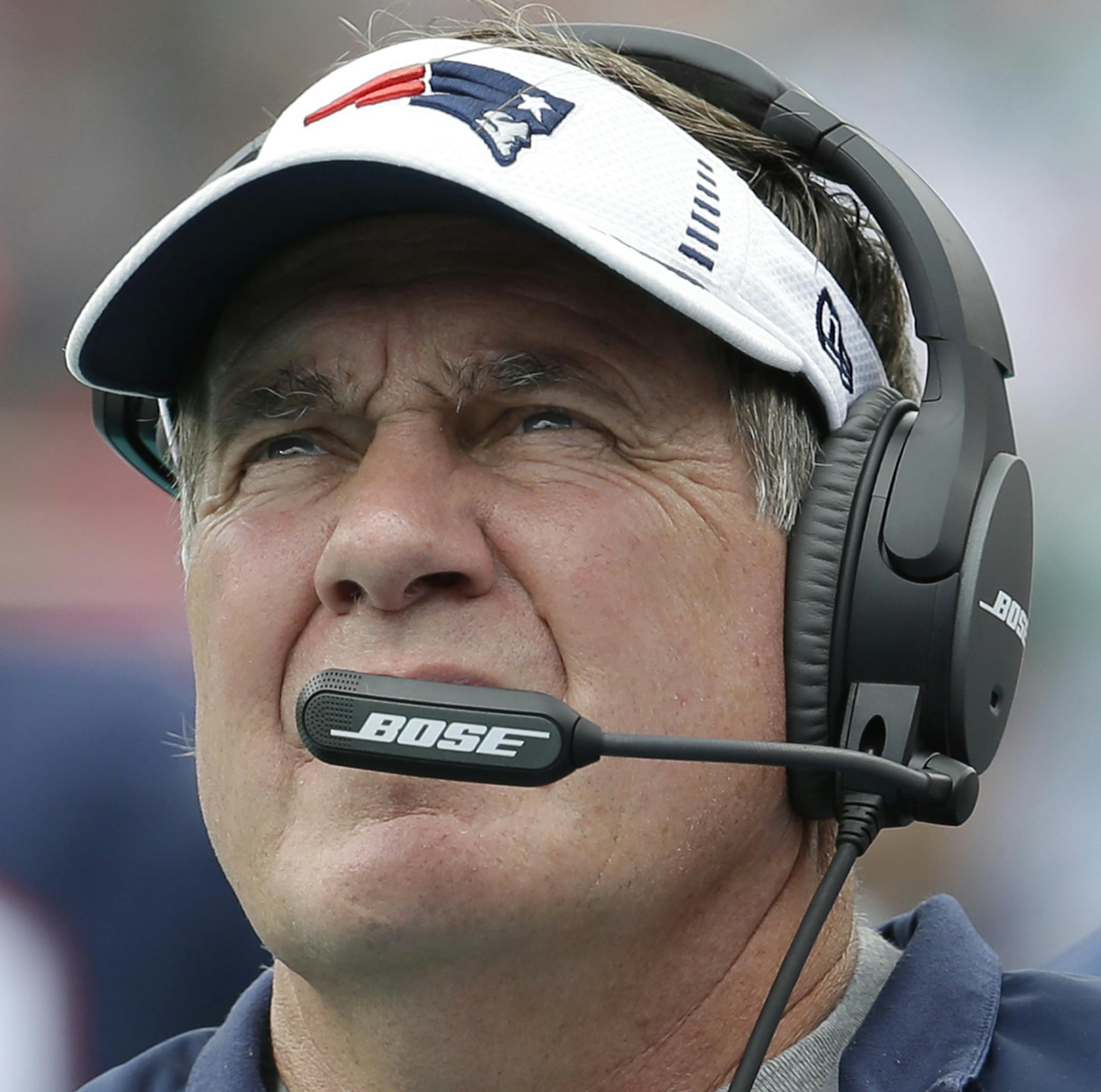 New England Patriots head coach Bill Belichick looks up during the first half of an NFL football game against the Miami Dolphins, in Miami Garden, Fla., Sunday Sept. 7, 2014. (AP Photo/Lynne Sladky)