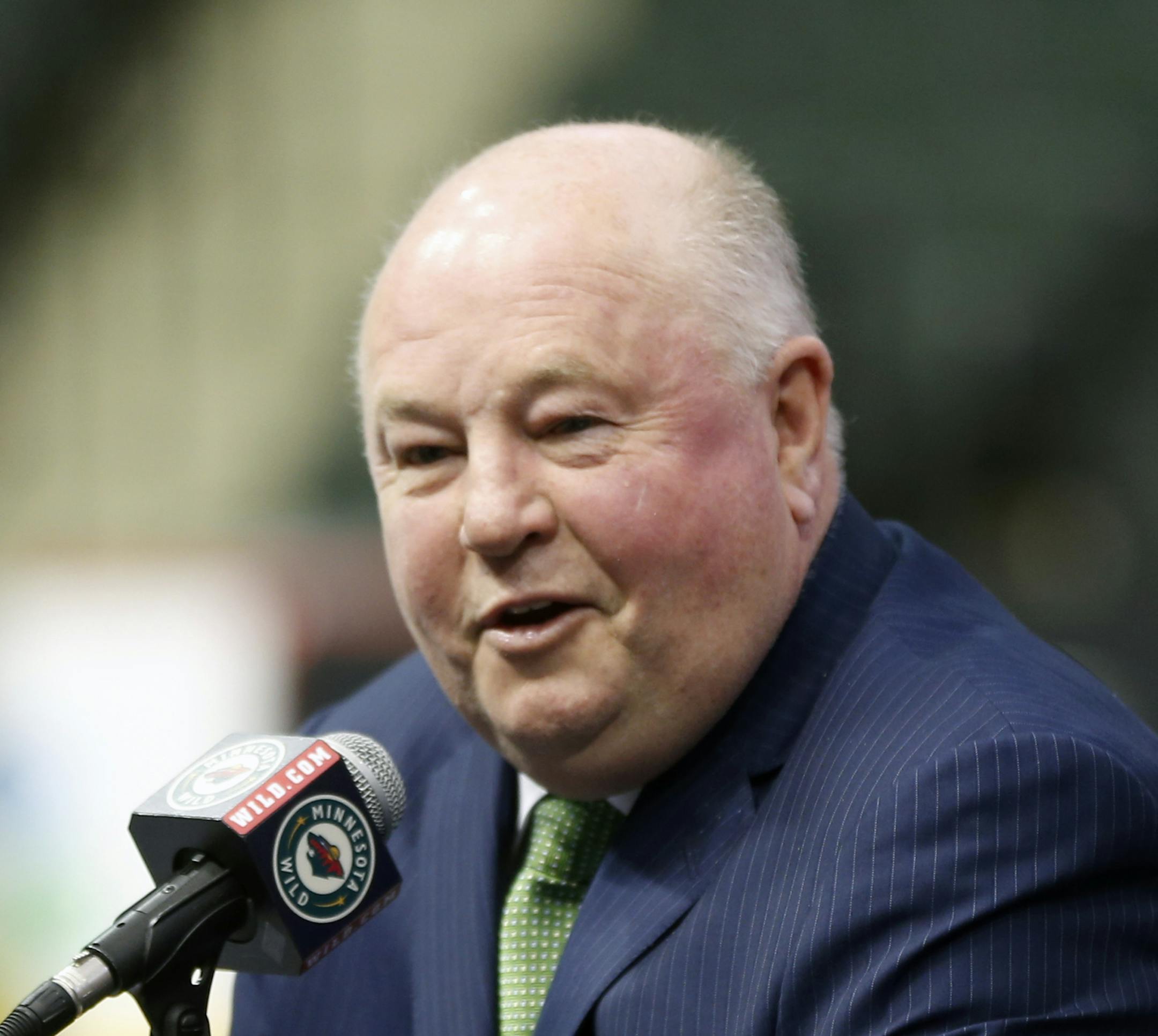 Bruce Boudreau is introduced as the new Minnesota Wild head coach during a news conference by the NHL hockey team Tuesday, May 10, 2016, in St. Paul, Minn. (AP Photo/Jim Mone)