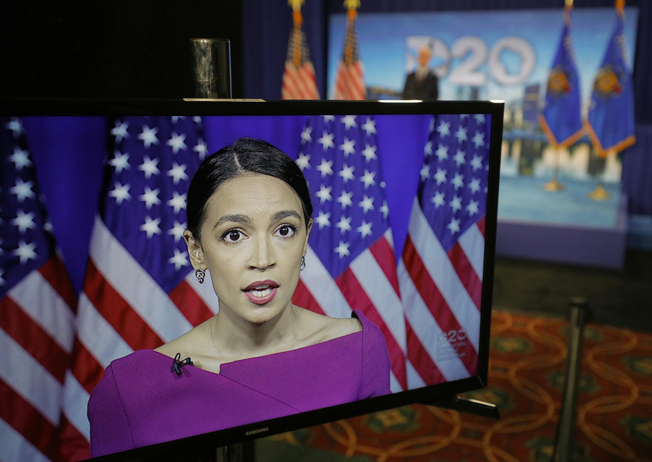 Rep. Alexandria Ocasio-Cortez, D-N.Y., seconds the nomination of Democratic presidential candidate, Sen. Bernie Sanders, I-Vt., via video feed during the second night of the virtual 2020 Democratic National Convention in Milwaukee, Wisc., Tuesday, Aug. 18, 2020. (Brian Snyder/Pool via AP)