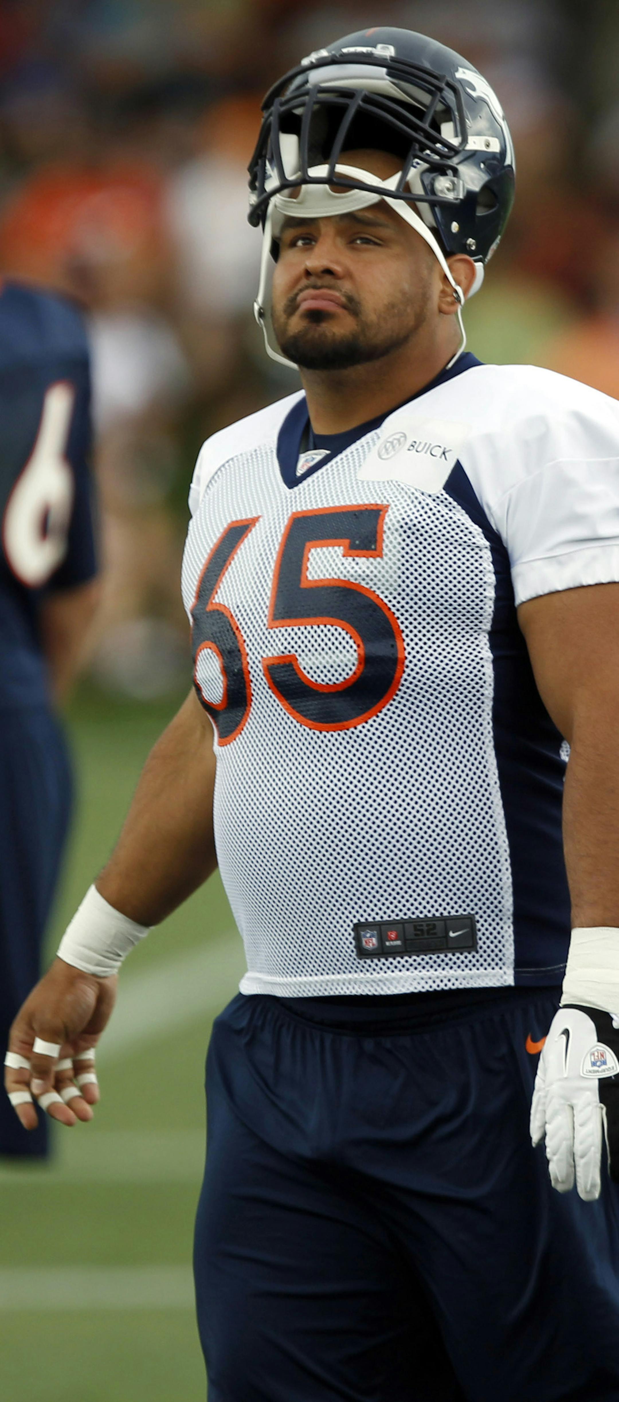 Denver Broncos guard Manny Ramirez takes part in drills at the team's training camp in Englewood, Colo., on Friday, July 27, 2012. (AP Photo/David Zalubowski) ORG XMIT: OTKDZ117