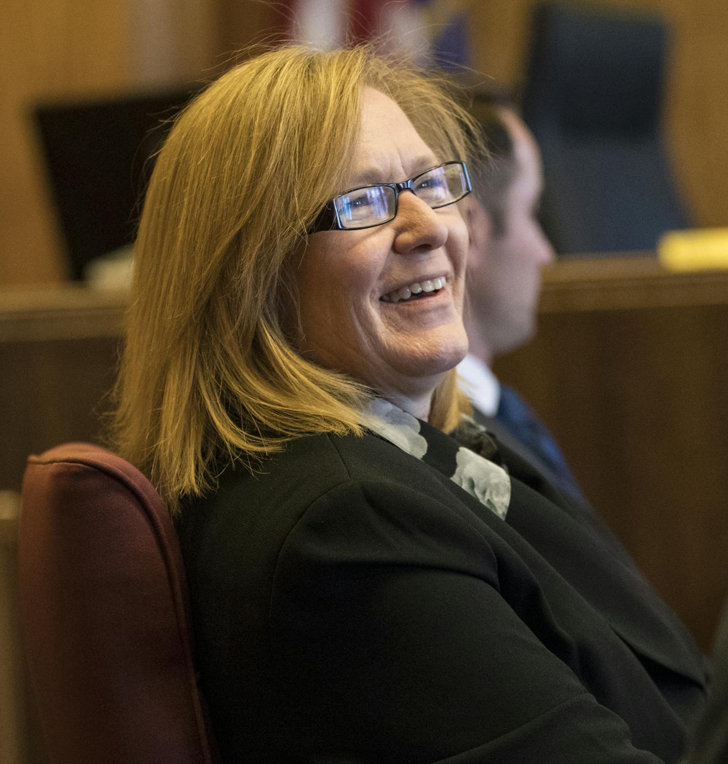 Lt. Gov. Michelle Fischbach chatted with one of her lawyers before a motion hearing in the civil lawsuit claiming she should give up her Senate seat after becoming Lieutenant Governor when former Lt. Gov. Sen. Tina Smith was appointed to the U.S. Senate. Photographed on Tuesday, February 6, 2018, at the Ramsey County Courthouse in St. Paul, Minn. ] RENEE JONES SCHNEIDER &#x2022; renee.jones@startribune.com