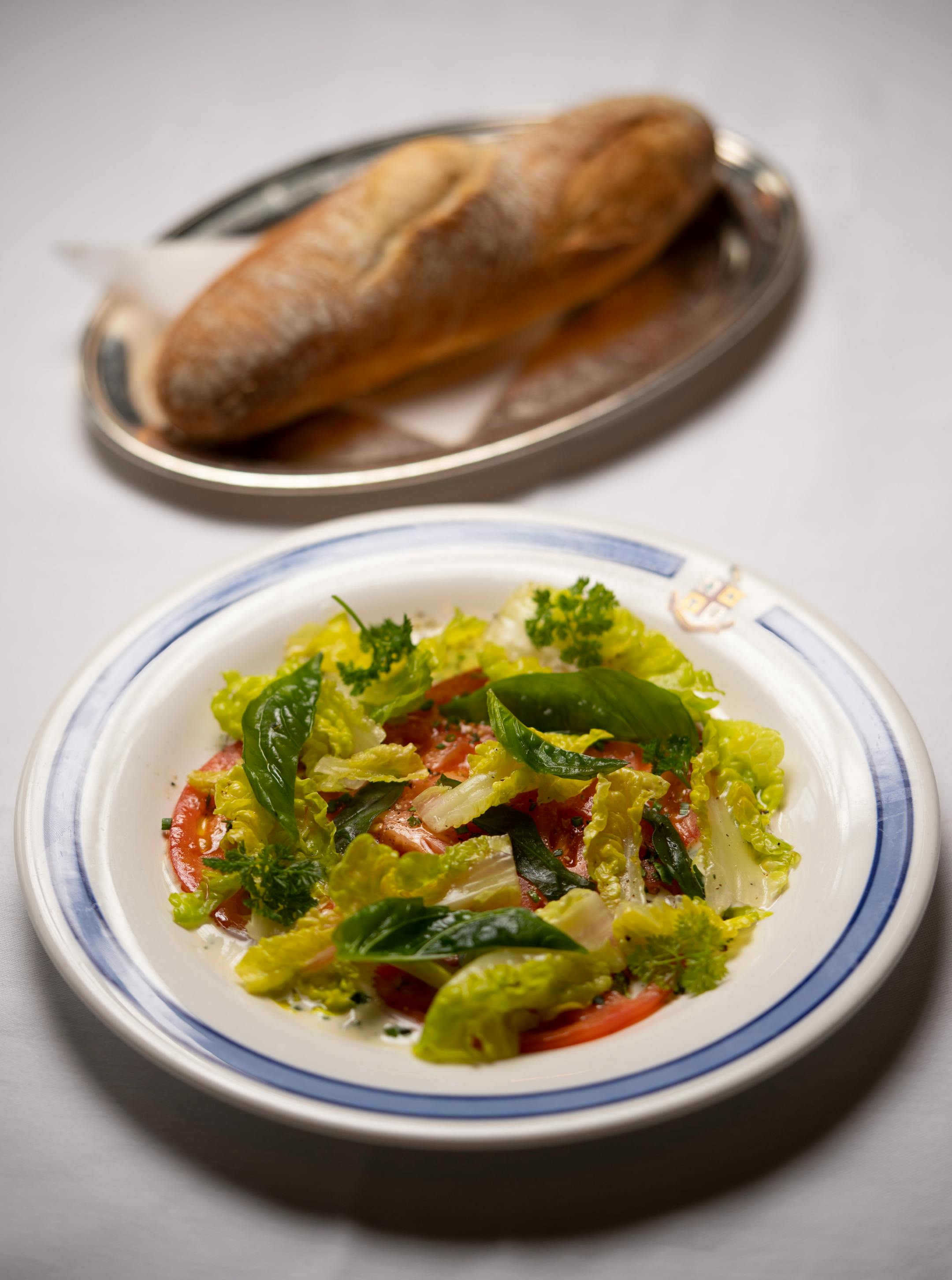Gem lettuce and tomato salad, as prepared under the direction of chef Jamie Mlone at Charlie's at the Minneapolis Club.