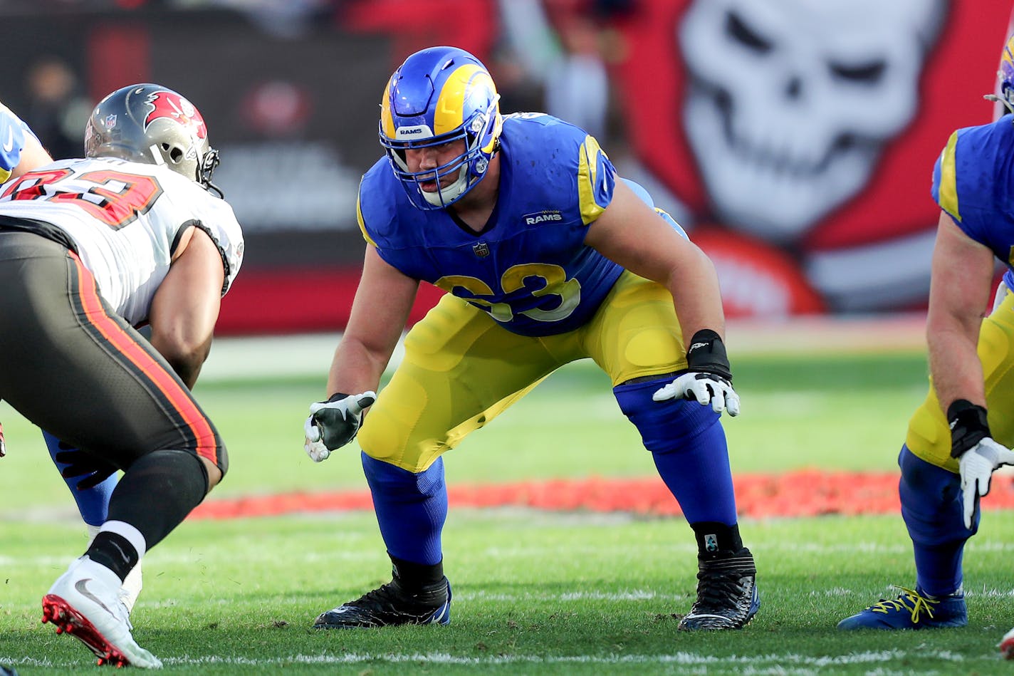 Los Angeles Rams guard Austin Corbett (63) reacts to the snap during a NFL divisional playoff football game between the Los Angeles Rams and Tampa Bay Buccaneers, Sunday, January 23, 2022 in Tampa, Fla. (AP Photo/Alex Menendez)