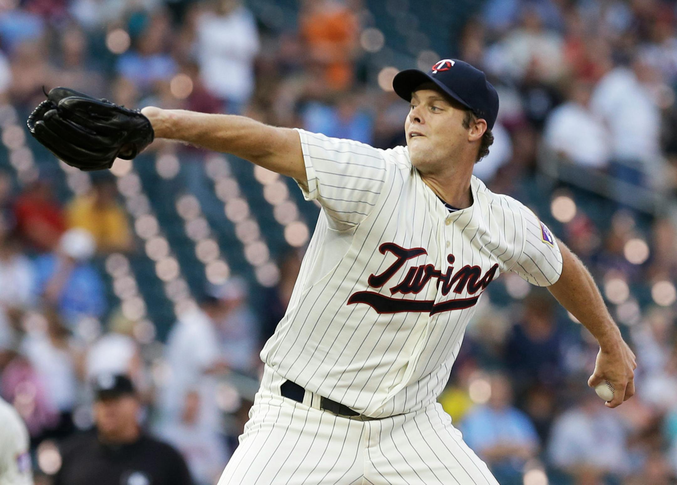 Minnesota Twins pitcher Andrew Albers throws against the Kansas City Royals in the first inning of a baseball game on Wednesday, Aug. 28, 2013, in Minneapolis. (AP Photo/Jim Mone)