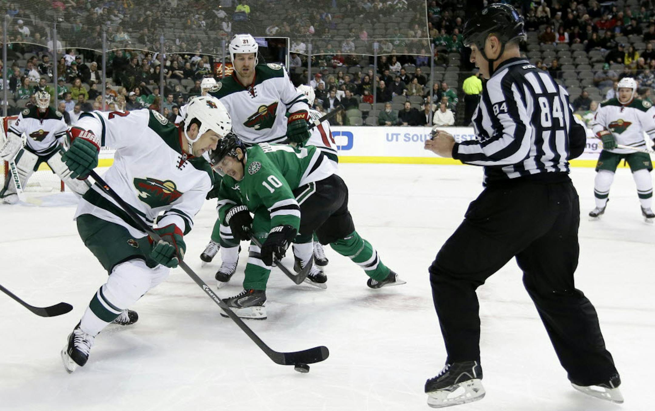 Wild defenseman Keith Ballard (2) won a faceoff against Dallas' Shawn Horcoff (10) in the Stars' 4-0 victory Tuesday night.