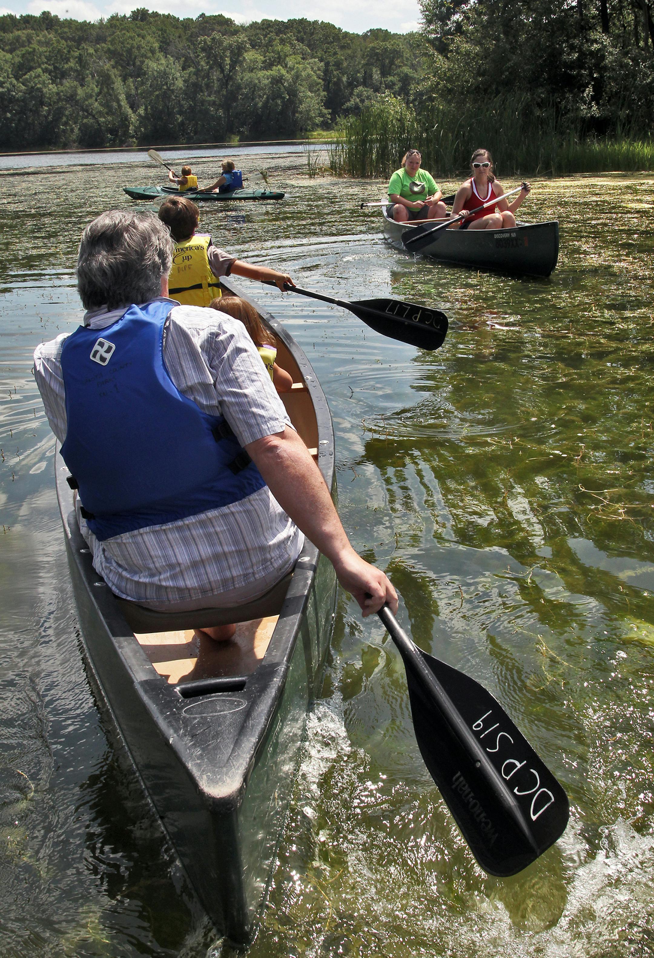 Lebanon Hills Regional Park in Eagan has a dozen lakes and ponds and offers rental canoes, kayaks and paddle boards that you can paddle and portage through 7 of the lakes on a 5-mile trip. Paddlers on Schulze Lake. (MARLIN LEVISON/STARTRIBUNE(mlevison@startribune.com (cq ) ORG XMIT: MIN2013051510181822