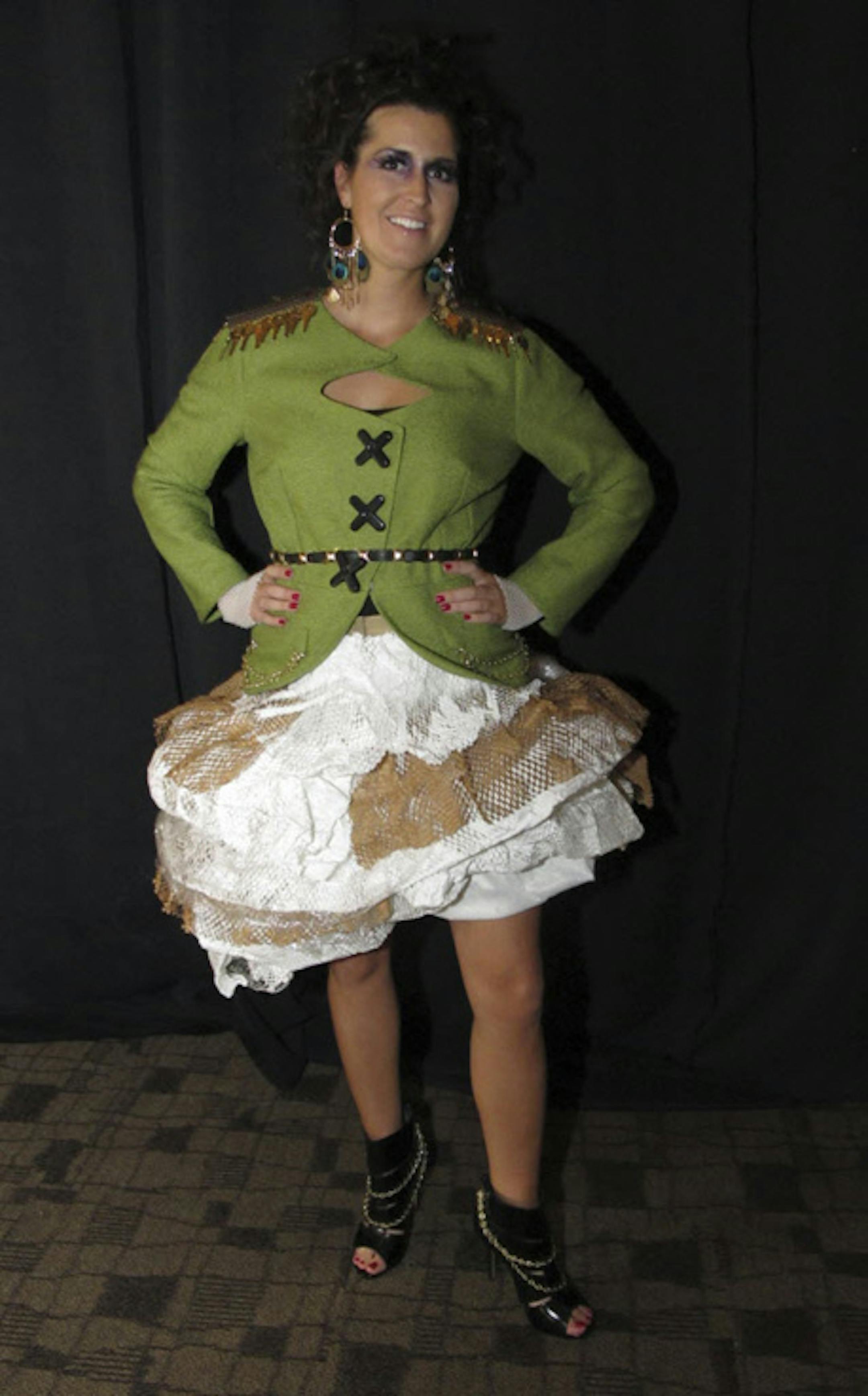 Sonya Sweeney of Intereum in a dress of packing materials, fabric leftovers and keys.