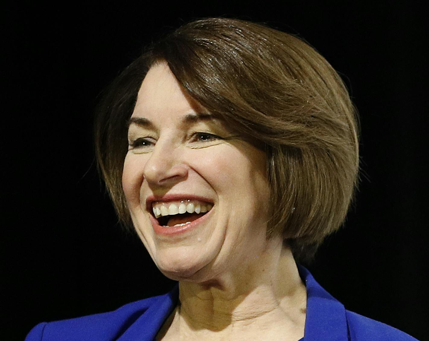 Democratic presidential candidate Sen. Amy Klobuchar, D-Minn., walks onstage to participate in a candidate forum on infrastructure at the University of Nevada, Las Vegas, Sunday, Feb. 16, 2020, in Las Vegas. (AP Photo/Patrick Semansky)