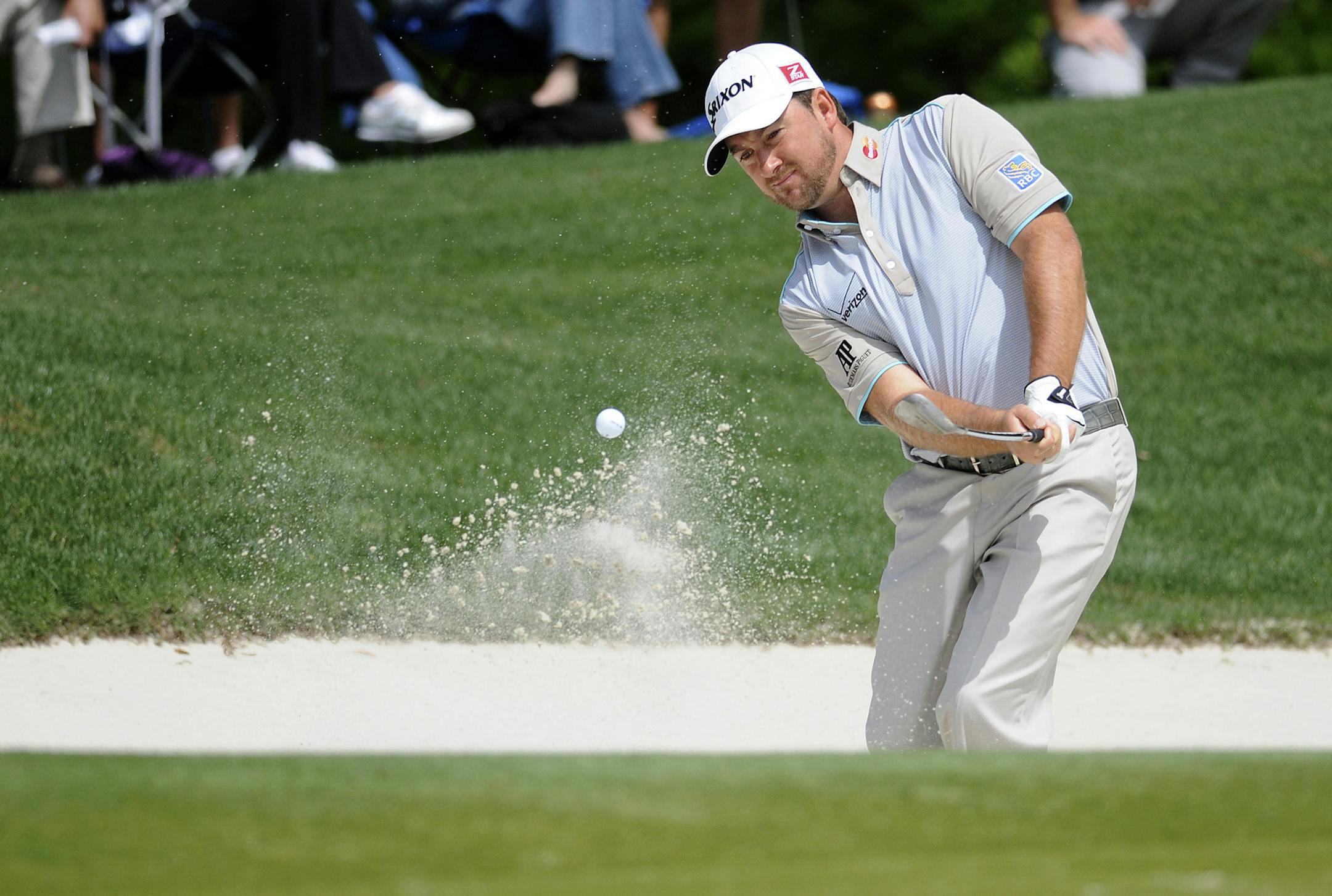 Graeme McDowell chips from a bunker at No. 6 during the final round of the RBC Heritage Presented by Boeing at Harbour Town Golf Links in Sea Pines on Hilton Head Island, South Carolina, on Sunday, April 21, 2013. (Delayna Earley/The Island Packet/MCT)