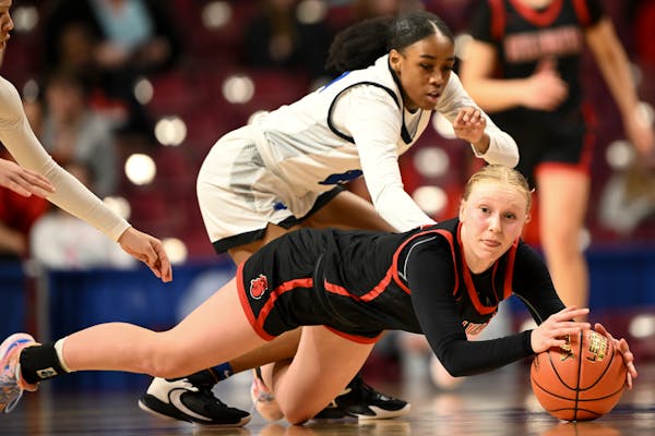Stillwater guard Amy Thompson, shown against Hopkins in last season's Class 4A girls basketball tournament, is a school record-holder now.