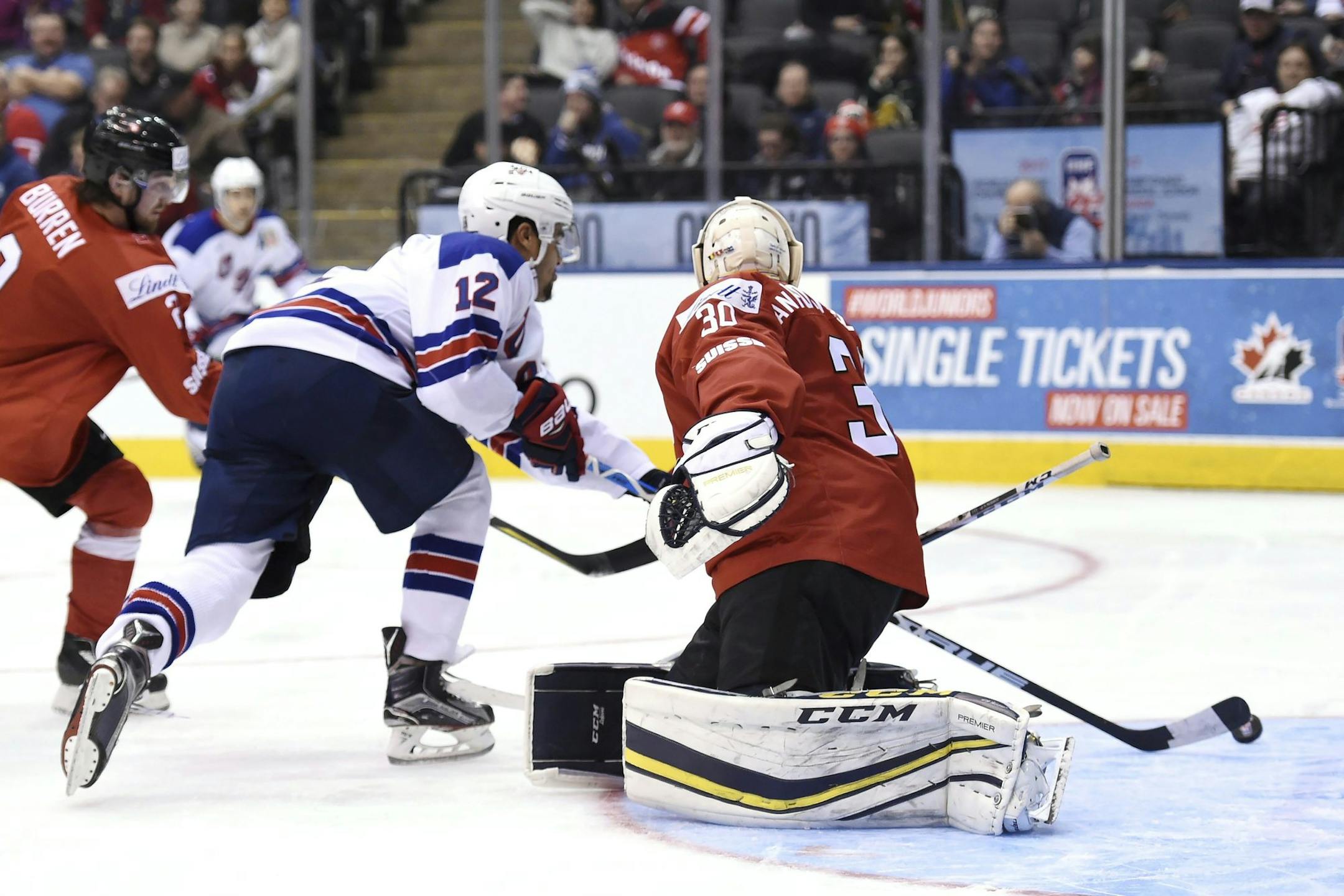 Jordan Greenway, scoring against Switzerland in the world junior tournament, is a top prospect for the U.S. Olympic team. He's a former Wild draft choice who plays at Boston University.