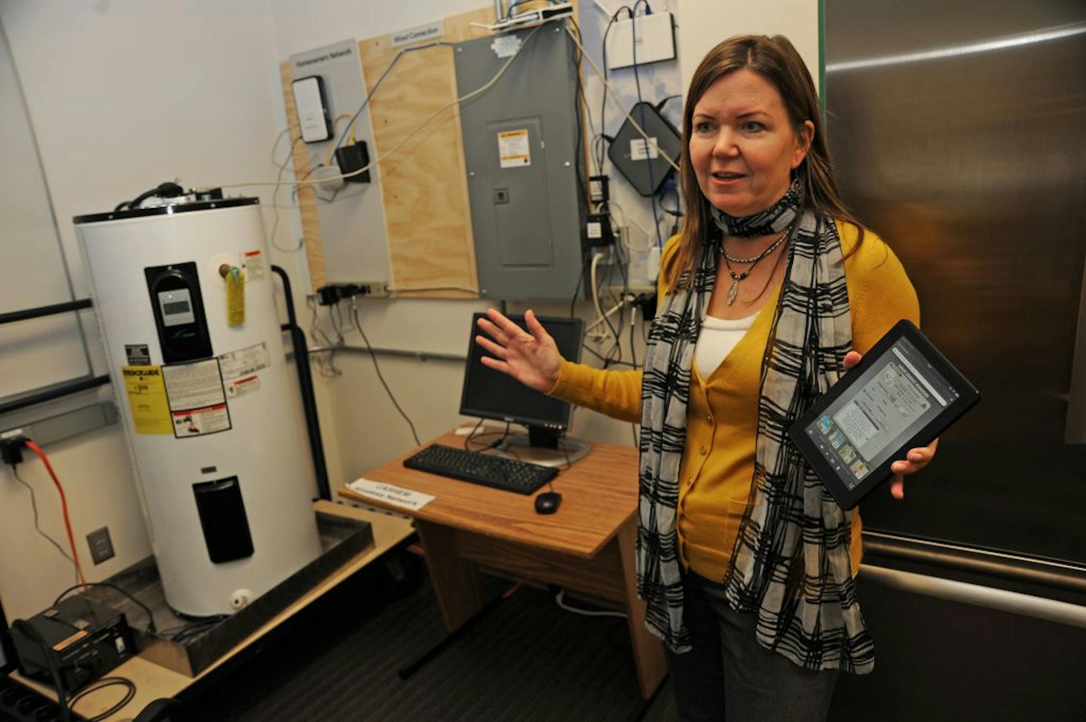 Honeywell has a number of new smart technology devices in the testing stage . They include a fire fighter breathing apparatus that has a built-in locator that can track an individual fire fighter in real time and in 3D. The other devices are a combined iris scanner and facial recognition screening camera and a smart device that gives home owners information on the energy efficiency home devices ranging from a game console to a refrigerator. Wendy Foslien, Research Fellow of the Knowledge Service