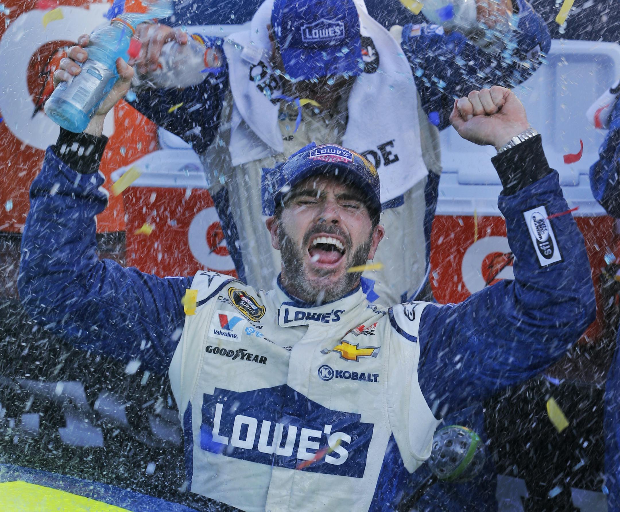 Jimmie Johnson celebrated after winning the NASCAR Sprint Cup race at Martinsville Speedway in Martinsville, Va., on Sunday.