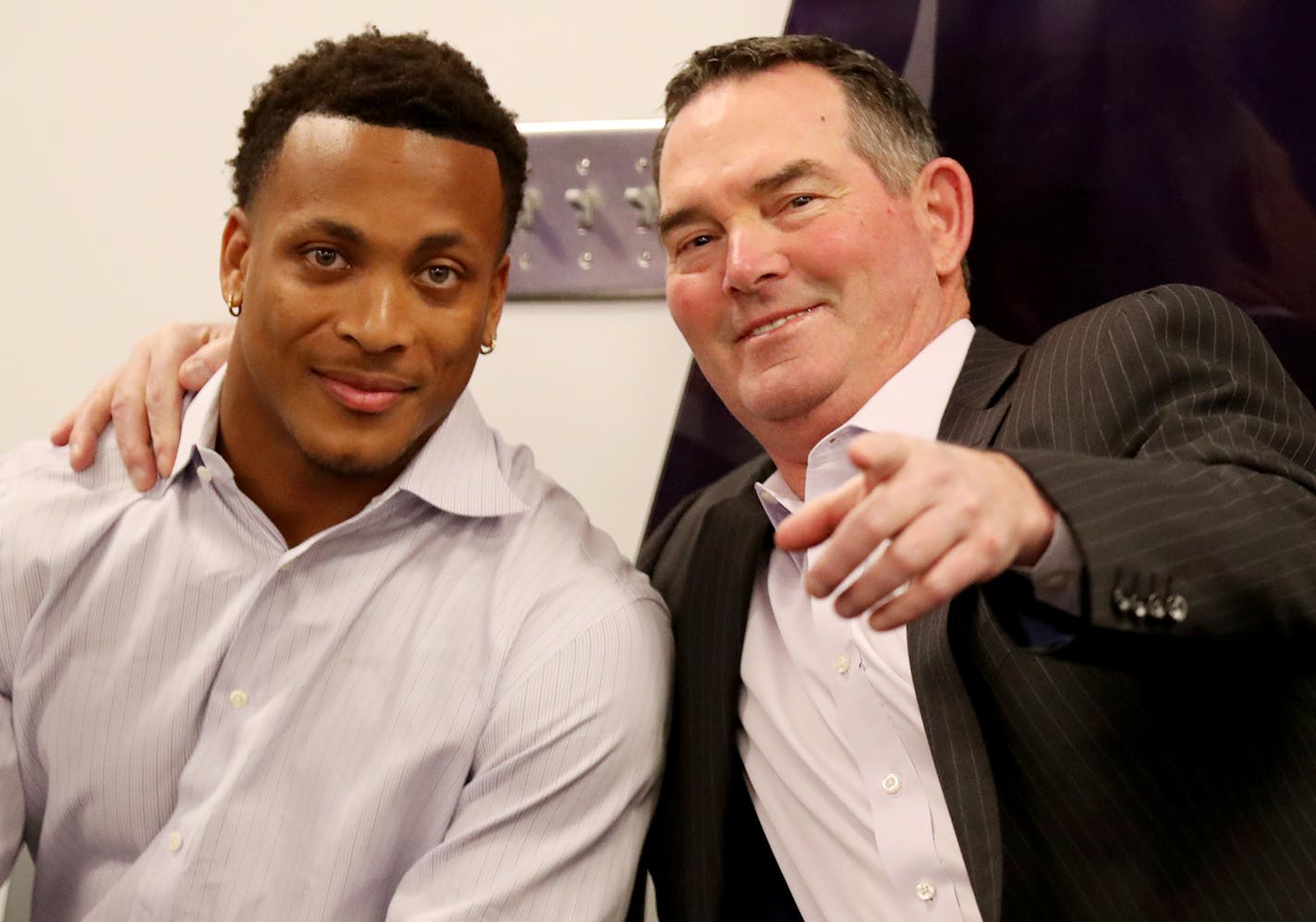 Before formally being introduced to local media members Vikings first round pick Mike Hughes from the University of Central Florida is directed towards a camera by head coach Mike Zimmer