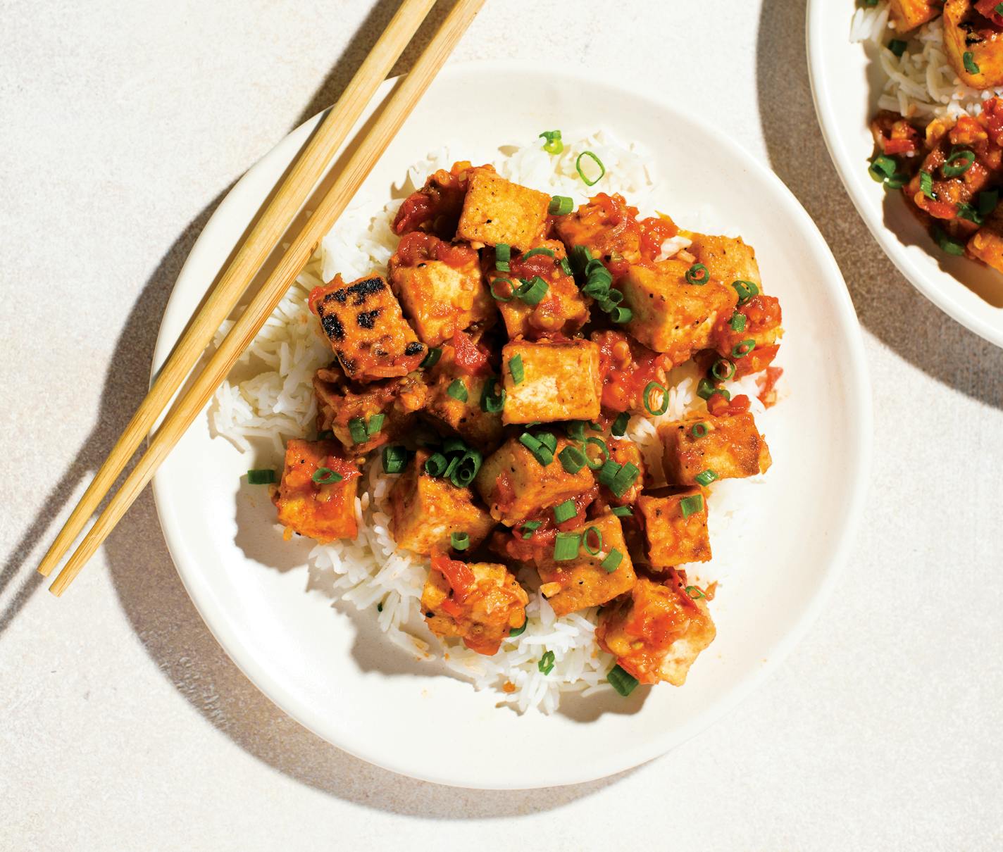 Vietnamese-Style Tofu with Gingery Tomato Sauce from Milk Street's "Cook What You Have," by Christopher Kimball (Voracious 2022). Credit: Connie Miller