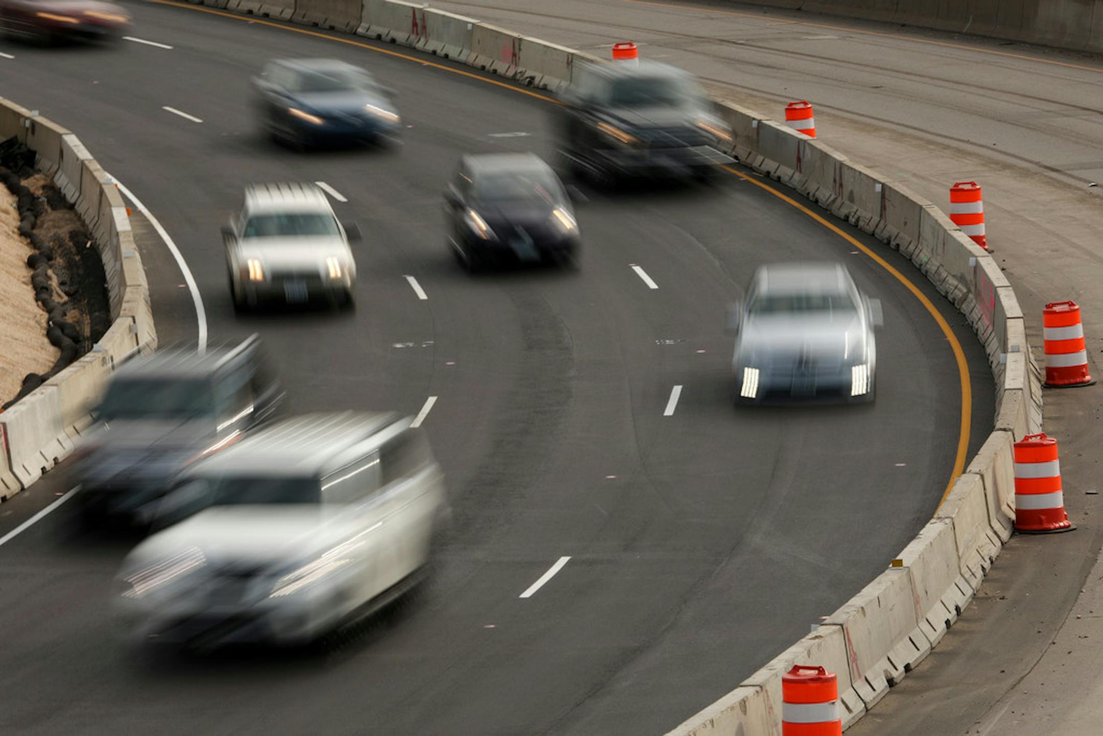 Commuters passed by ongoing road construction on I-35W during the evening rush hour Friday, June 15, 2018.