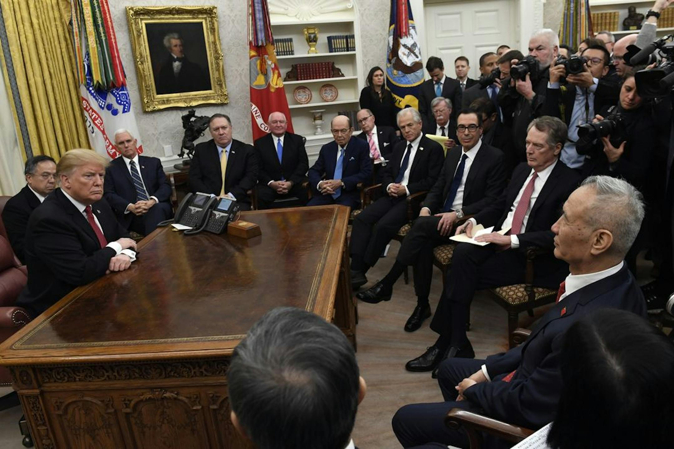 President Donald Trump, left, meets with Chinese Vice Premier Liu He, front right, at the White House in Washington, Thursday, Jan. 31, 2019.