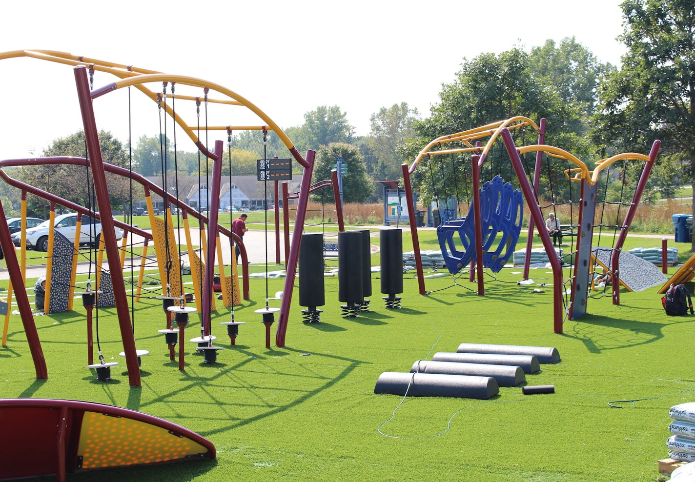 Workers put the finishing touches on the new challenge course at Schaper Park in Golden Valley this week. It is the first of its kind in the state.