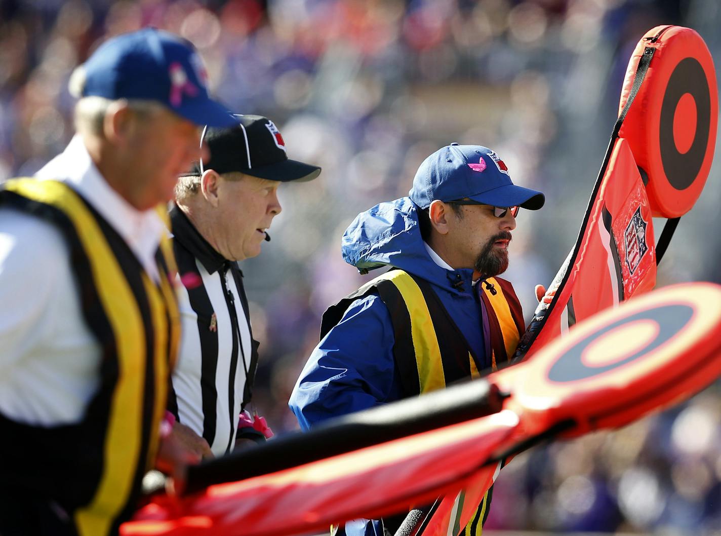 Phil Finanger, left, and Bill Hamann, right, ran back to the sideline after a measurement. ] CARLOS GONZALEZ &#xef; cgonzalez@startribune.com - October 18, 2015, Minneapolis, MN, TCF Bank Stadium, NFL, Minnesota Vikings vs. Kansas City Chiefs