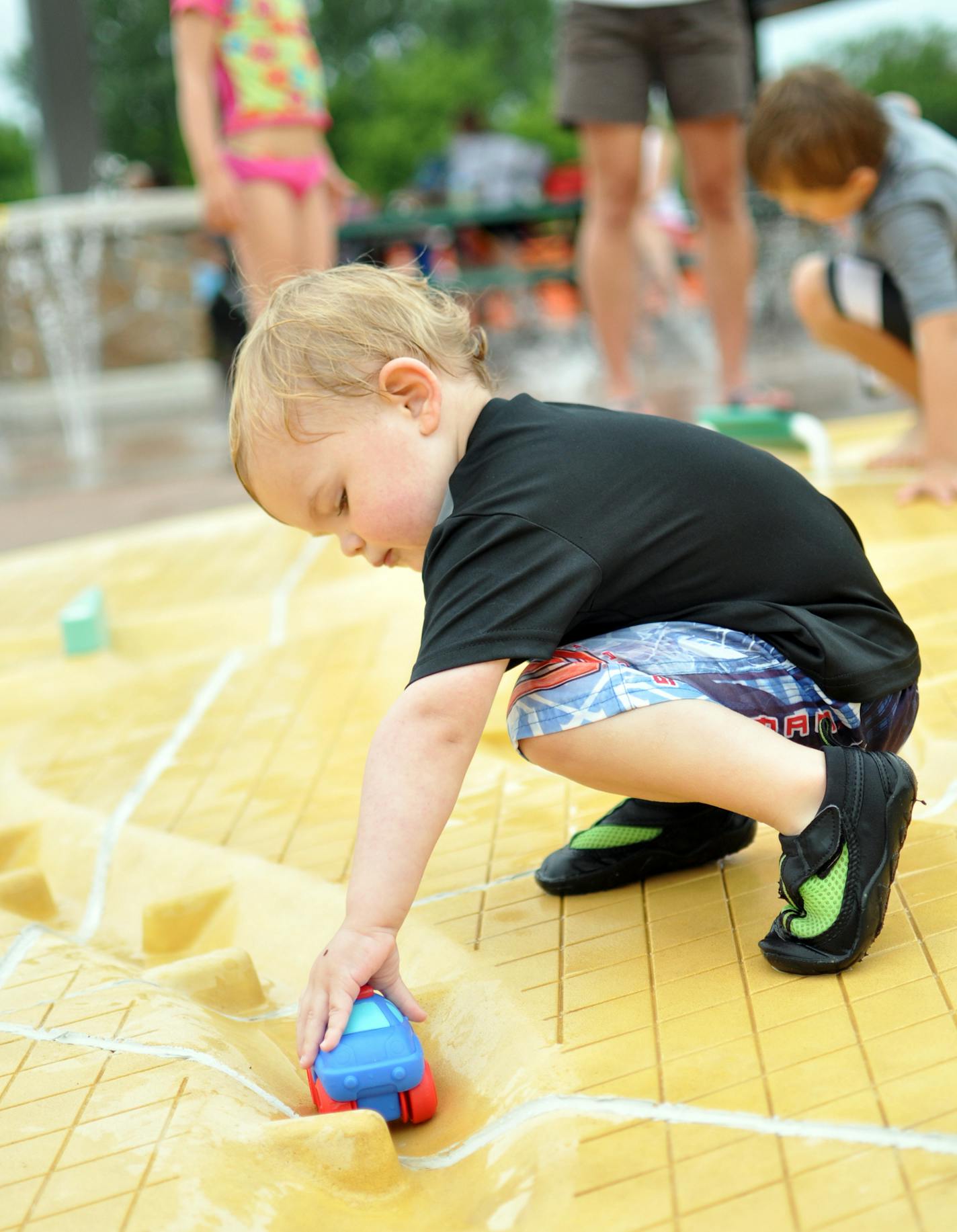 Easton Ford, 2, of Rosemount, enjoyed the &#x201c;water journey&#x201d; area. Photo by Liz Rolfsmeier, Special to the Star Tribune