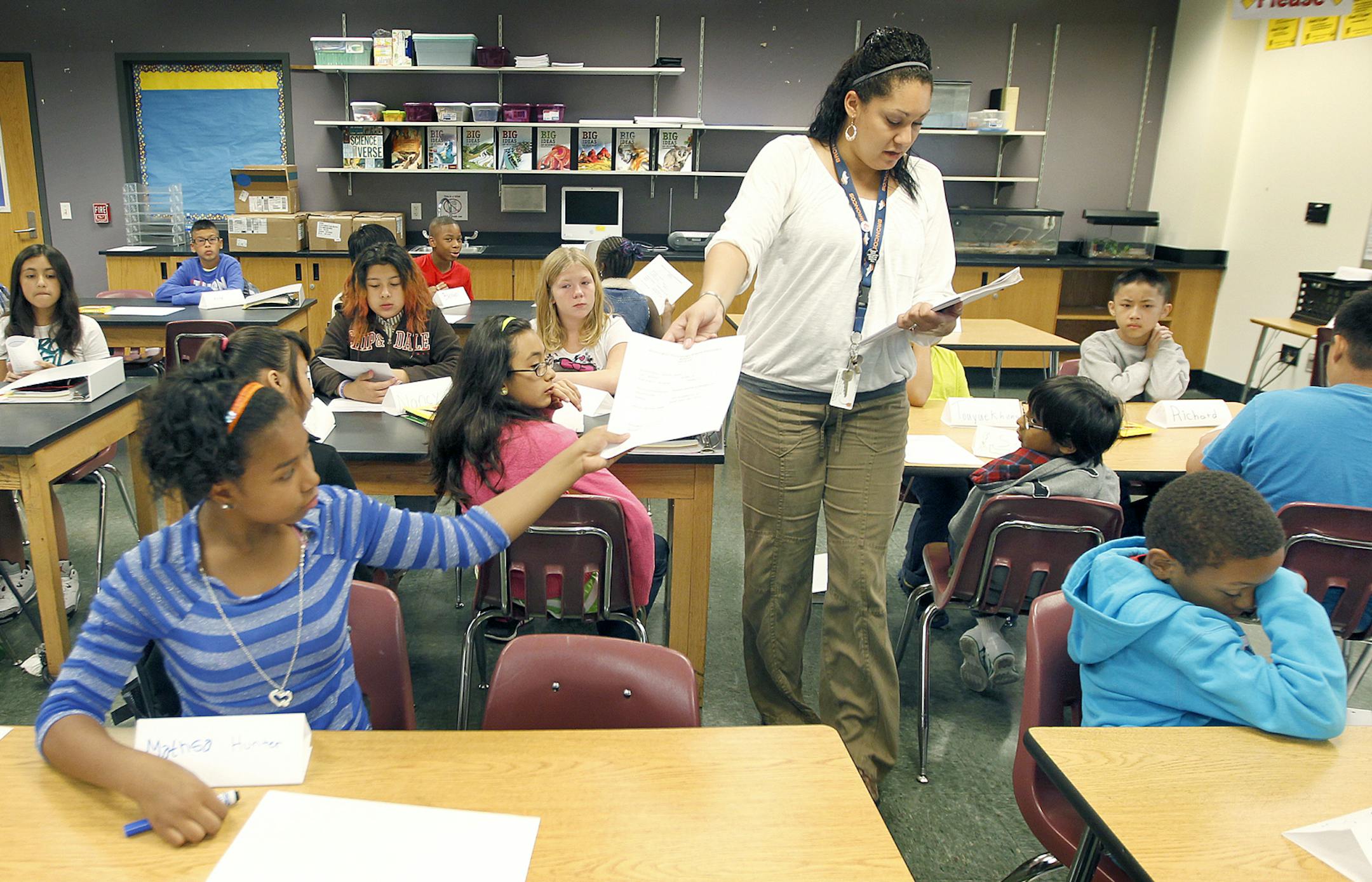 Washington Technology Magnet School Science teacher Laura McClendon spent the first hour of class teaching her sixth-graders the ins and outs of their new school, Tuesday.
