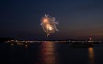 Fireworks burst over Lake Minnetonka Sunday night in this view from Lighthouse Island. ] JEFF WHEELER • jeff.wheeler@startribune.com